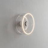 E27 LED-donutpære i klart glas, Ø 195 mm, tændt som væglampe i et enkelt interiør