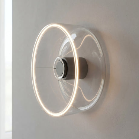 E27 LED-donutpære i klart glas, Ø 195 mm, som væglampe med en varm lysglorie