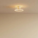 E27 LED-donutpære i klart glas, Ø 195 mm, tændt i loftet i et enkelt interiør