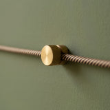 Vægkabelholder i metal til stofledning — Satineret bronze